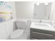 Clean bathroom with modern vanity and wall art at 2709 Fayetteville St # 01-A, Durham, NC 27707