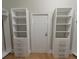 Bright walk-in closet with shelving, drawers, and ample storage space at 2709 Fayetteville St # 01-A, Durham, NC 27707