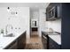 Modern kitchen with island, stainless steel appliances, and white cabinets at 521 N Mangum St # 25, Durham, NC 27701
