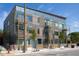Modern building exterior with wood and metal accents at 521 N Mangum St # 25, Durham, NC 27701