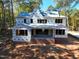 New home under construction, rear view showing large porch and backyard at 1805 Okeefe Ln # 1D, Raleigh, NC 27613