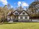 Two-story home with stone accents and a large front yard at 143 Hook Dr # 23, Fuquay Varina, NC 27526