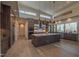 Modern kitchen with large island, stainless steel appliances, and hardwood floors at 31 Meandering Way Ct, Chapel Hill, NC 27516