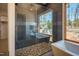 Bathroom with walk-in shower and pebble floor at 31 Meandering Way Ct, Chapel Hill, NC 27516
