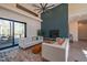 Spacious living room featuring a modern fireplace and access to a deck at 31 Meandering Way Ct, Chapel Hill, NC 27516