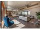 Open-concept living room with hardwood floors, high ceilings, and a view of the kitchen at 31 Meandering Way Ct, Chapel Hill, NC 27516