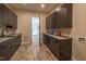 Functional laundry room with ample cabinetry and countertop space at 31 Meandering Way Ct, Chapel Hill, NC 27516