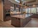 Modern kitchen with large island, double ovens, and ample cabinetry at 31 Meandering Way Ct, Chapel Hill, NC 27516
