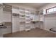Large walk-in closet with ample shelving and hanging space at 31 Meandering Way Ct, Chapel Hill, NC 27516