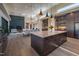 Open concept kitchen with large island, hardwood floors, and modern appliances at 31 Meandering Way Ct, Chapel Hill, NC 27516