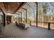 Spacious deck with pergola, offering scenic wooded views and ample seating at 31 Meandering Way Ct, Chapel Hill, NC 27516