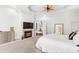 Main bedroom with fireplace, large TV, and access to upper level at 40002 Worth, Chapel Hill, NC 27517