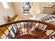 Grand staircase with wrought iron railing and chandelier at 40002 Worth, Chapel Hill, NC 27517