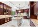 Spacious kitchen with large island, granite countertops, and ample cabinetry at 40002 Worth, Chapel Hill, NC 27517