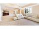 Large basement living area with sectional sofa and natural light at 40002 Worth, Chapel Hill, NC 27517