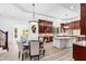 Gourmet kitchen with island, breakfast nook, and custom cabinetry at 40002 Worth, Chapel Hill, NC 27517