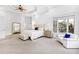 Main bedroom with high ceilings, plush carpeting, and a ceiling fan at 40002 Worth, Chapel Hill, NC 27517