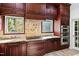 Kitchen features granite countertops, dark wood cabinets, and double ovens at 40002 Worth, Chapel Hill, NC 27517