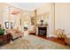 Living room with fireplace, hardwood floors, and comfortable seating at 40002 Worth, Chapel Hill, NC 27517