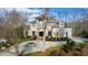 Stunning two-story home with circular driveway and mature trees at 40002 Worth, Chapel Hill, NC 27517