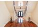 A different view of the grand double staircase from the foyer at 40002 Worth, Chapel Hill, NC 27517