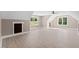 Spacious bonus room with wood-look floors and multiple windows at 4268 Jacks Creek Trl, Burlington, NC 27215