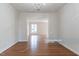 Elegant dining room with hardwood floors and a chandelier at 904 Grove St, Chapel Hill, NC 27517