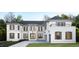 White brick exterior of a two-story home at 4218 Lambeth Dr, Raleigh, NC 27609
