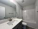 Modern bathroom with a vanity, bathtub, and a large mirror at 40 Longbow Dr, Middlesex, NC 27557