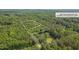 Aerial view showing property lines of a wooded lot near a road at 2222 Umstead Rd, Durham, NC 27712