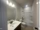 Bathroom with vanity, toilet and shower/tub combo at 116 Commons Cir # 229, Clayton, NC 27520