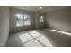 Bright bedroom with window overlooking the backyard at 116 Commons Cir # 229, Clayton, NC 27520