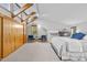 Main bedroom with high ceilings, sitting area, and ensuite bath at 2704 Barmettler St, Raleigh, NC 27607