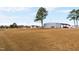 Large lot with commercial building and open field at 124 Don Ron Rd, Erwin, NC 28339