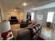 Cozy basement with gray couch and recliner at 124 Don Ron Rd, Erwin, NC 28339