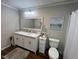 Clean bathroom with double vanity and updated fixtures at 124 Don Ron Rd, Erwin, NC 28339