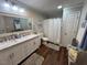 Elegant bathroom with double vanity and large mirror at 124 Don Ron Rd, Erwin, NC 28339