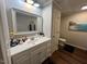Bathroom with vanity and large mirror at 124 Don Ron Rd, Erwin, NC 28339