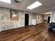 Common area features hardwood floors and brick accent wall at 124 Don Ron Rd, Erwin, NC 28339