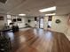 Large common area with hardwood floors and plenty of natural light at 124 Don Ron Rd, Erwin, NC 28339