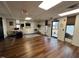 Large common area with hardwood floors and plenty of natural light at 124 Don Ron Rd, Erwin, NC 28339
