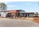 Commercial building exterior with red roof and covered porch at 124 Don Ron Rd, Erwin, NC 28339
