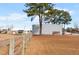 Wooden fence runs alongside property and building at 124 Don Ron Rd, Erwin, NC 28339