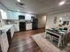 Modern kitchen with white cabinets and dark appliances at 124 Don Ron Rd, Erwin, NC 28339