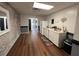 Small kitchenette with white cabinets and granite countertops at 124 Don Ron Rd, Erwin, NC 28339