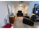 Relaxing living room with comfortable seating and fireplace at 124 Don Ron Rd, Erwin, NC 28339