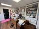 Spacious office with built-in shelving and hardwood floors at 124 Don Ron Rd, Erwin, NC 28339