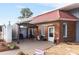 Brick patio with pergola and seating area at 124 Don Ron Rd, Erwin, NC 28339