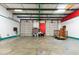 Large warehouse featuring ample space and two roll-up doors at 124 Don Ron Rd, Erwin, NC 28339