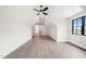 Spacious bonus room with hardwood floors and large window at 1804 Stream Manor Ct, Wake Forest, NC 27587